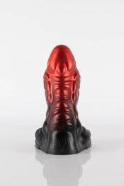 A product photo of a dragon dildo taken from the back showing a pentagram.