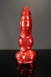 A front-facing product photo of a dog dildo with balls.