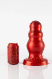 A size comparison photo of a XXL red bubble butt plug. 