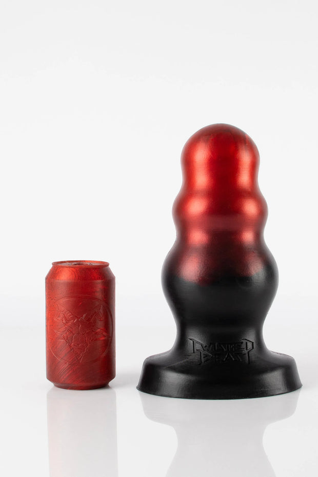 A size comparison photo of an XXL bubble butt plug. 