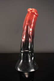 A product photo of a red and black horse dildo by Twisted Beast.