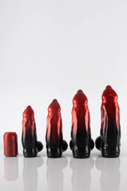 A size comparison of four different demon dildo sizes next to a can.