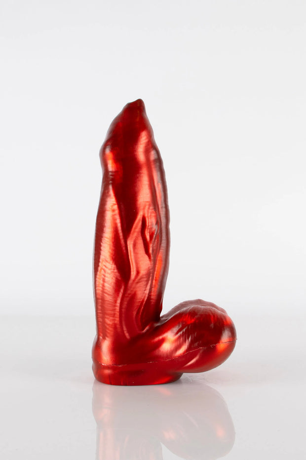 A product photo of a demon dildo taken from the side.