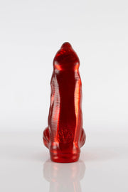 A product photo of a demon dildo taken from behind.