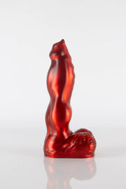 A product photo of a red dog dildo taken from the side.