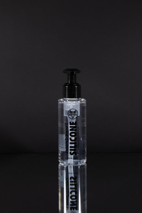 A product photo of a 100ml bottle of silicone lube.