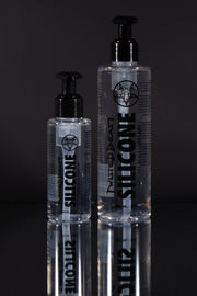 A size comparison of two bottles of Twisted Beast silicone lube.