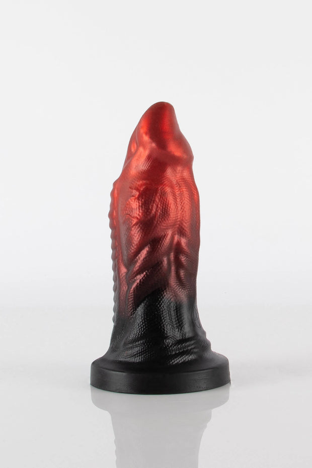 A product photo of a reptile dildo by Twisted Beast taken from a side profile.