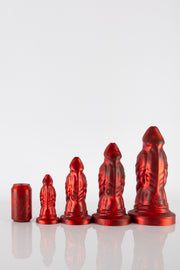 A size chart of 4 red reptile dildos placed next to a can. 