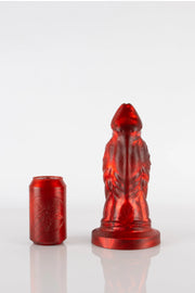 A product photo of a large, red reptile dildo.